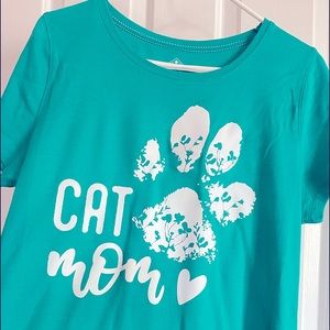 Teal woman’s cat mom shirt. Color may be slightly different due to lighting.